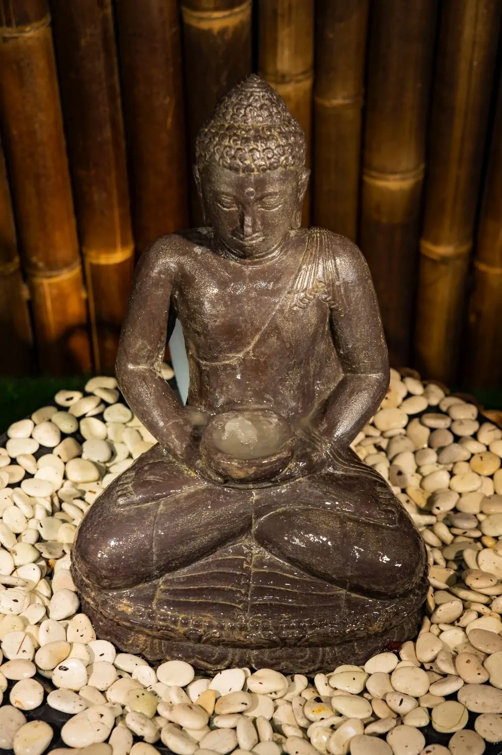  Product image 2 of the product “Seated Buddha with bowl in his hands as water feature 37 x 24 x 51cm. Stone cast, handcrafted & coloured ”